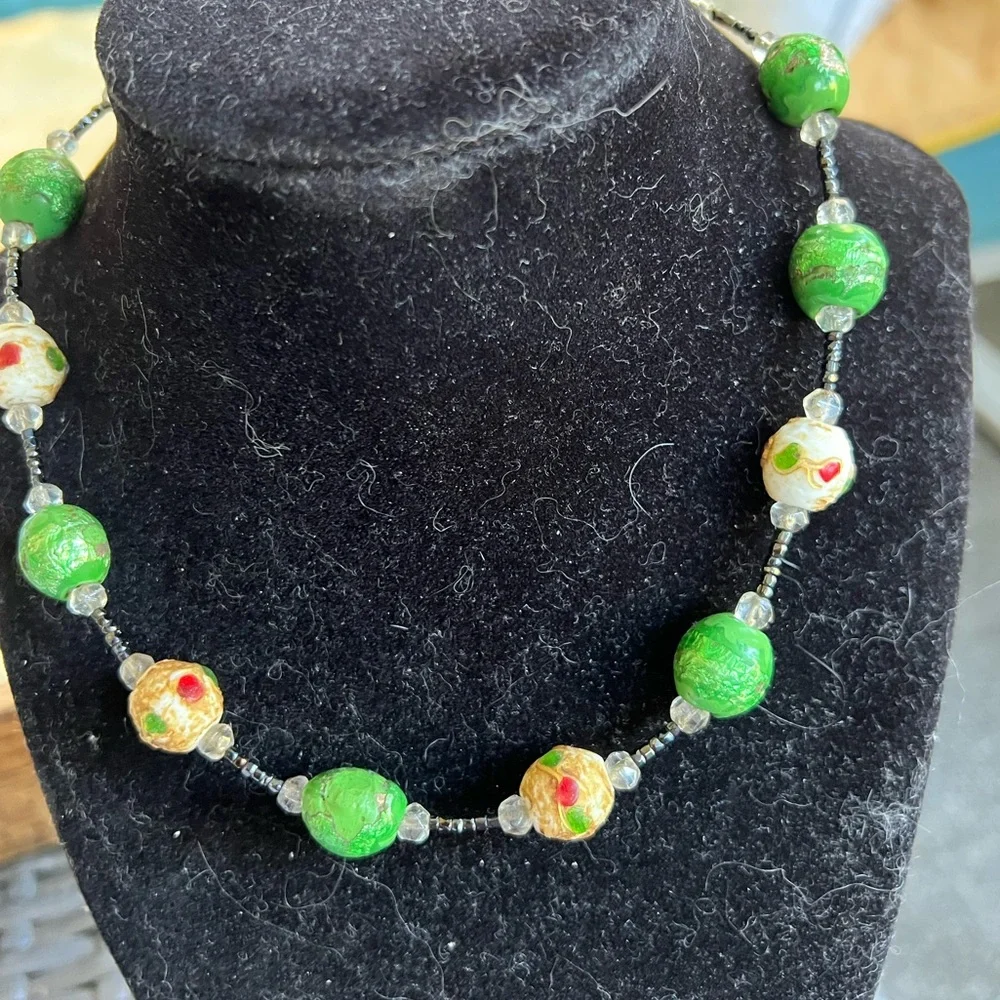 Vintage wedding cake glass beads hand knotted green, cream and red necklace.